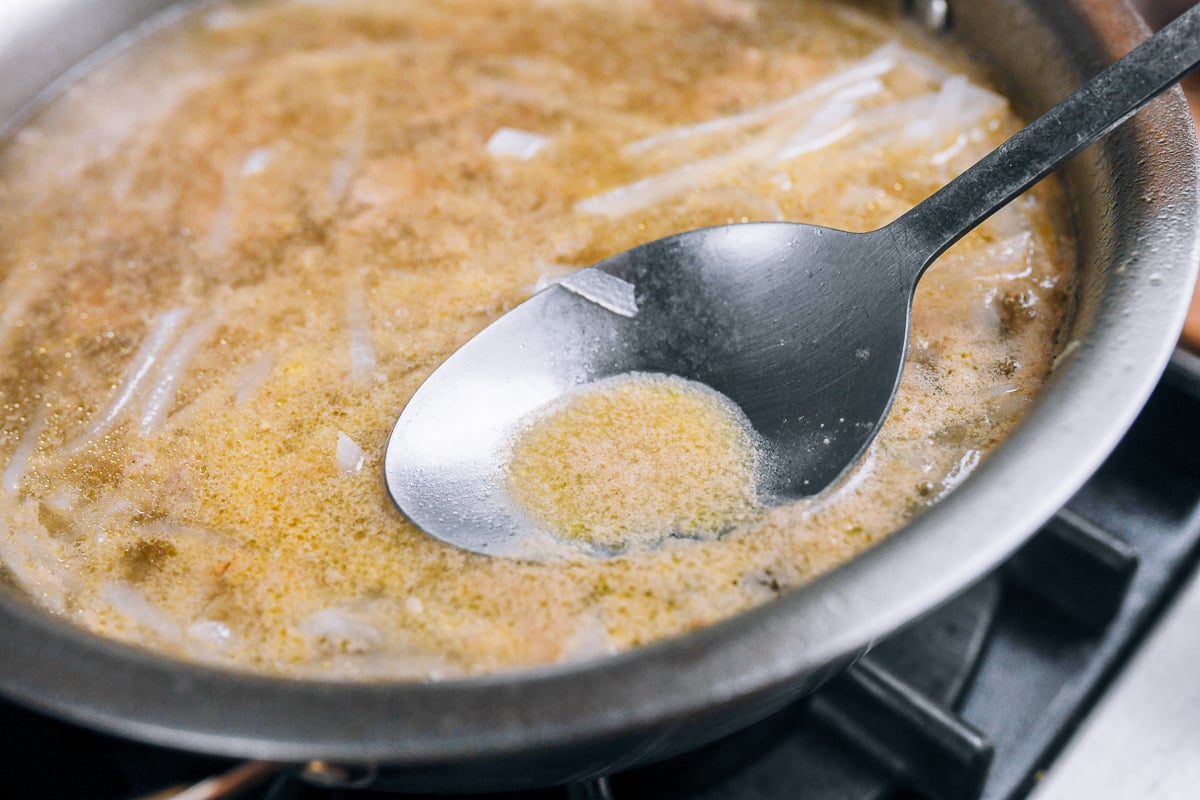 skimming foam off of soup