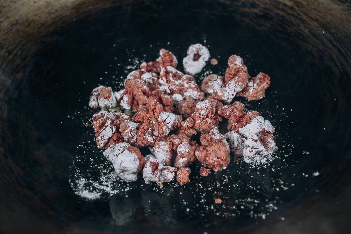 browning ground beef in wok